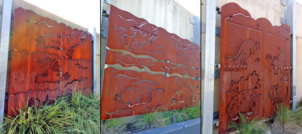 Three of five panels along the Freeway Albury, artists Michael Laubli & Leti Gavioli